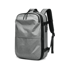 Load image into Gallery viewer, Expandable Travel Backpack with Vacuum Compression
